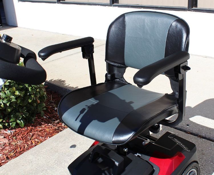 Drive Scout mobility scooter showing cushioned seat, armrests, and adjustable comfort features
