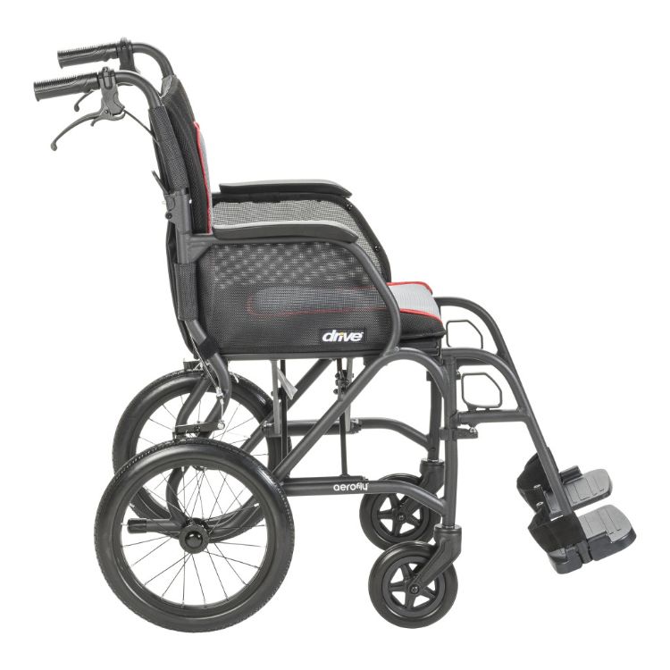Side view of the Drive Medical ultralight magnesium alloy transport chair showing the lightweight frame, rear wheel, front caster, and footrest.